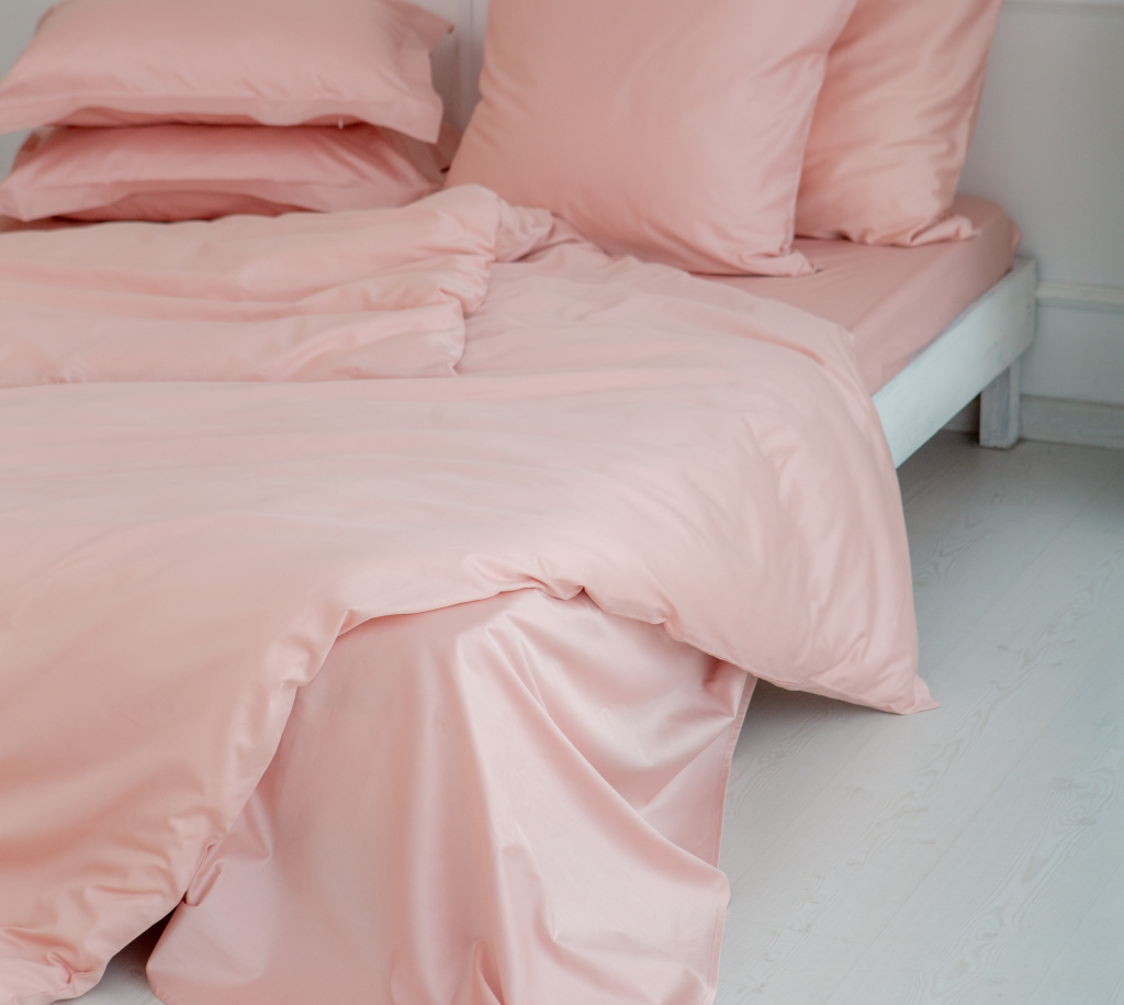 на какой температуре стирать постельное белье